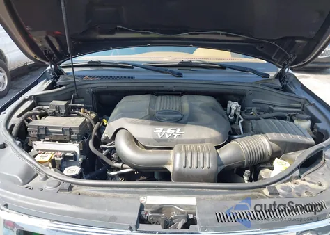 2012 Jeep Grand Cherokee Overland из США, поврежденный, VIN 1C4RJFCG4CC324331